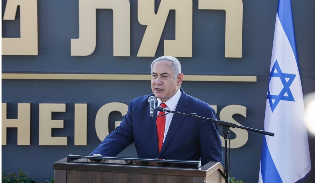 Netanyahu gives a speech after unveiling the sign. Photo: AFP