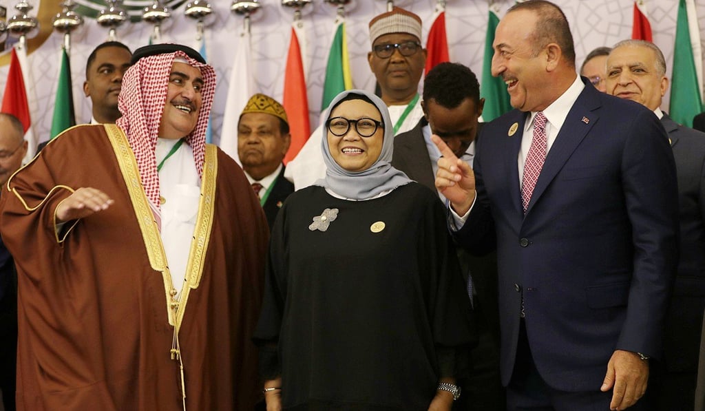 Indonesia’s Foreign Minister Retno Marsudi with Bahrain’s Foreign Minister Khalid bin Ahmed al Khalifa (left) and Turkey’s Foreign Minister Mevlut Cavusoglu at a summit in Saudi Arabia in May. Photo: Reuters