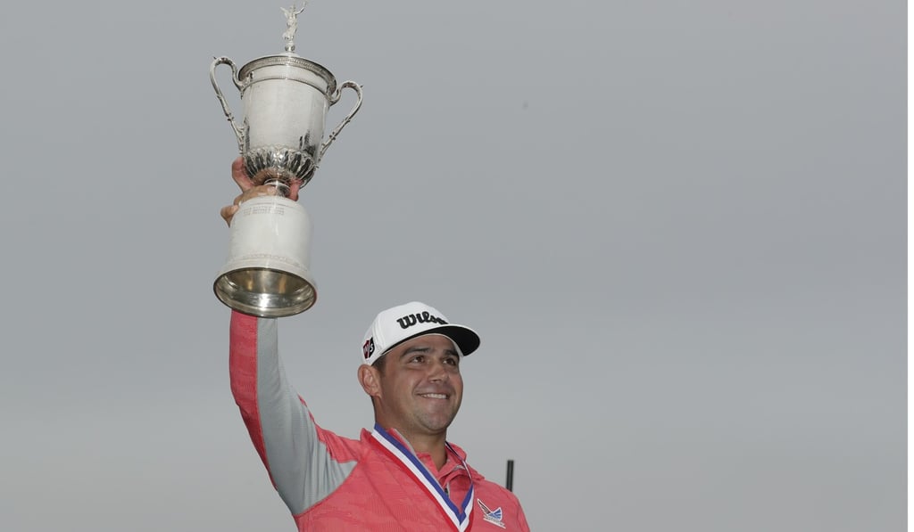 Gary Woodland celebrates with the trophy after winning the US Open. Photo: AP Gary Woodland celebrates with the trophy after winning the US Open. Photo: AP