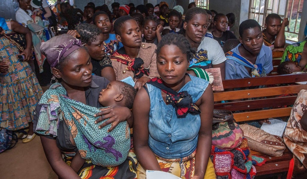 Mothers wait for their babies to receive treatment for malaria in Lilongwe, Malawi in April. Photo: AFP Mothers wait for their babies to receive treatment for malaria in Lilongwe, Malawi in April. Photo: AFP