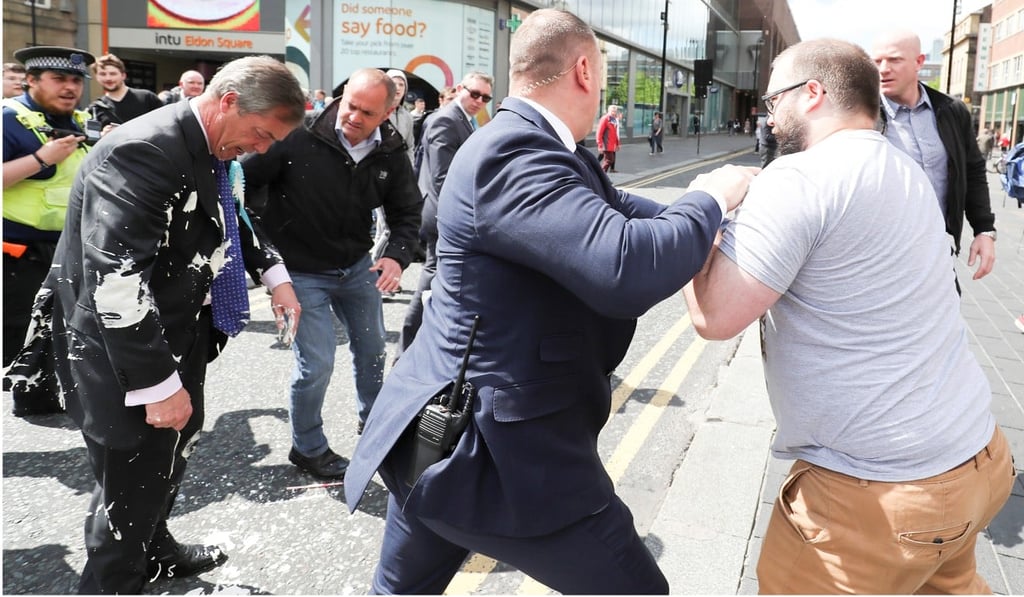 Nigel Farage after being hit with a milkshake in Newcastle. Photo: Reuters