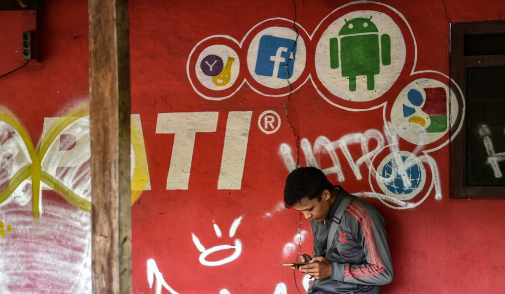 Indonesia has 54 million Facebook users, making it the fourth biggest Facebook using nation. Photo: AFP/Bay Ismoyo