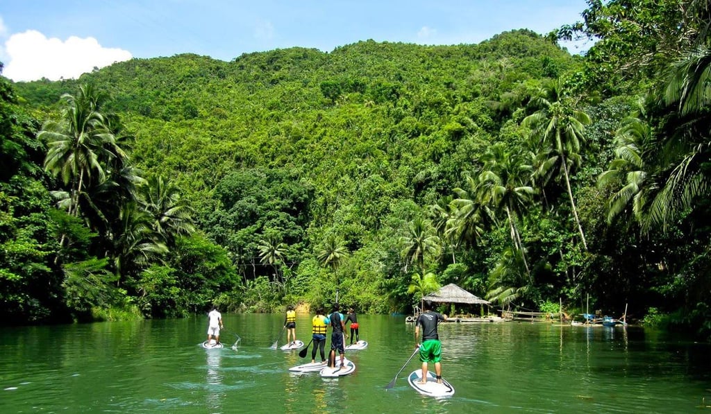 Paddle boarding in Bohol. Paddle boarding in Bohol.