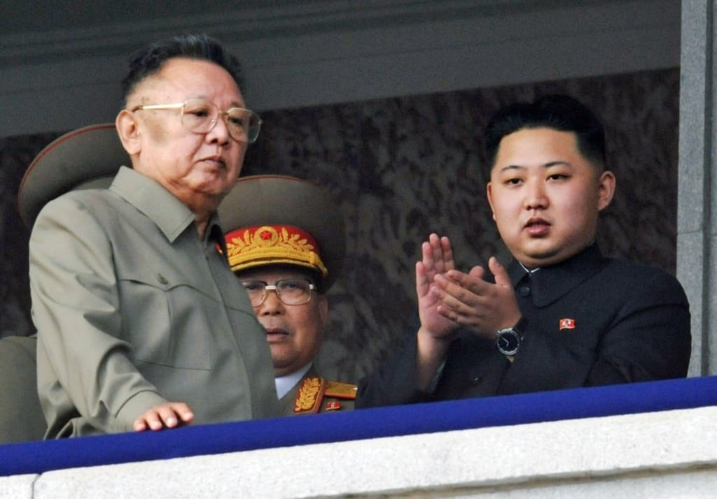 Late North Korean leader Kim Jong-il (left) with his son in 2011. Photo: AP
