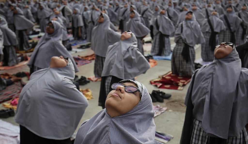 Muslim students perform yoga at a school in Ahmedabad, India. Photo: Reuters Muslim students perform yoga at a school in Ahmedabad, India. Photo: Reuters