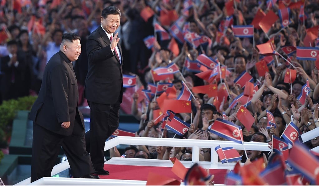 Kim Jong-un and Xi Jinping attend a mass gymnastics and arts performance in Pyongyang on Thursday evening. Photo: Xinhua via AP Kim Jong-un and Xi Jinping attend a mass gymnastics and arts performance in Pyongyang on Thursday evening. Photo: Xinhua via AP