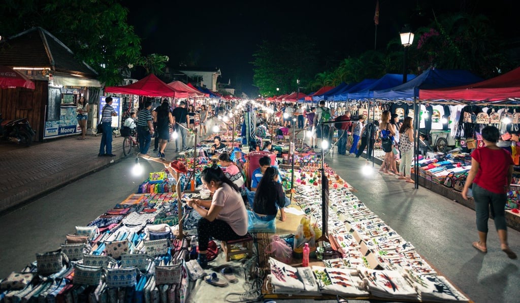 The night market along Thanon Sisavangvong peddles locally made handicrafts in a quietly civilised manner. Photo: Shutterstock The night market along Thanon Sisavangvong peddles locally made handicrafts in a quietly civilised manner. Photo: Shutterstock