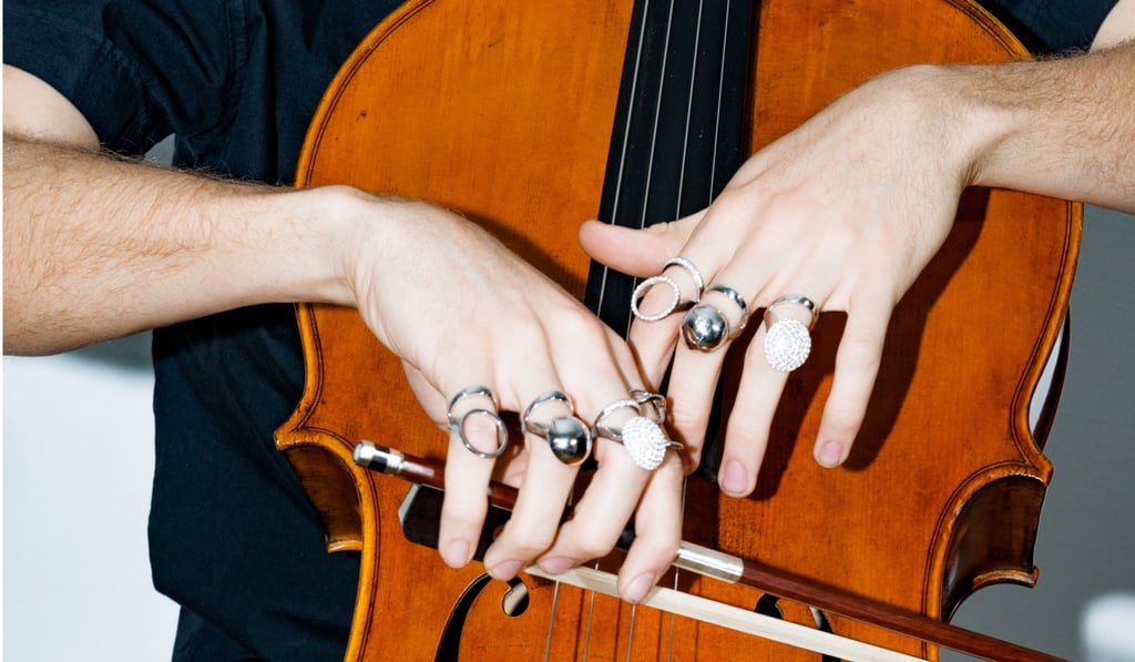 Jewellery by Alan Crocetti worn by cello player Patrick Belaga. Jewellery by Alan Crocetti worn by cello player Patrick Belaga.