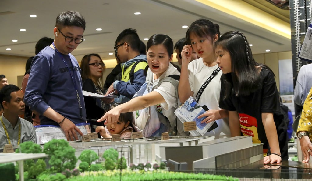 Prospective buyers are seen at Wheelock Properties’ sales centre at Harbour City in Tsim Sha Tsui. The builder had put up 500 flats on sale at its Montara development in Lohas Park on May 4, 2019. Photo: Edmond So.