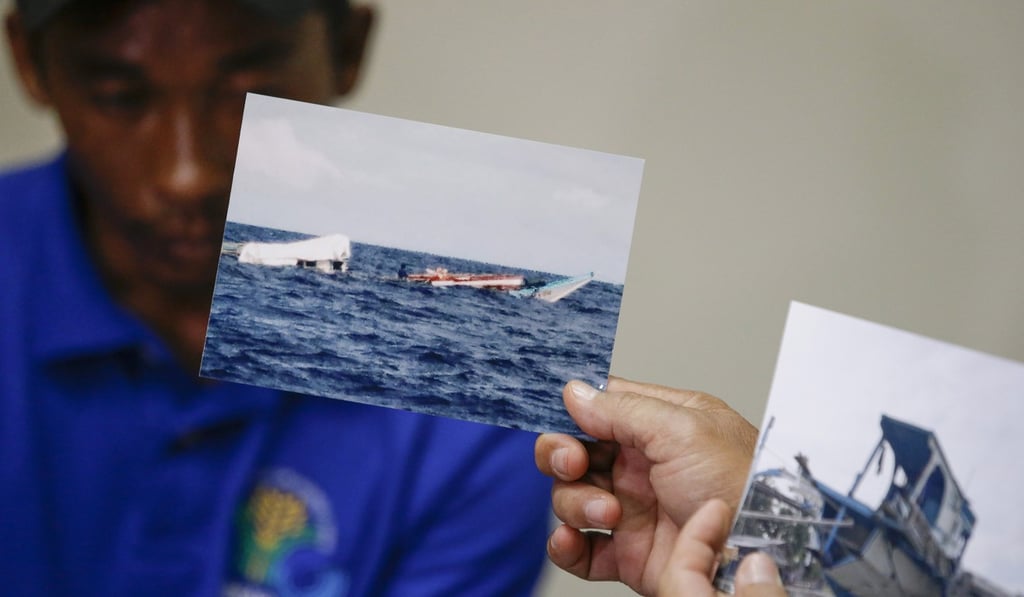 Pictures of the damaged Filipino fishing vessel are shown next to one of its crew members on June 17. Photo: AP