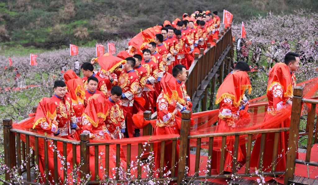 A wedding parade in Shiqian county in Guizhou province. Photo: Xinhua