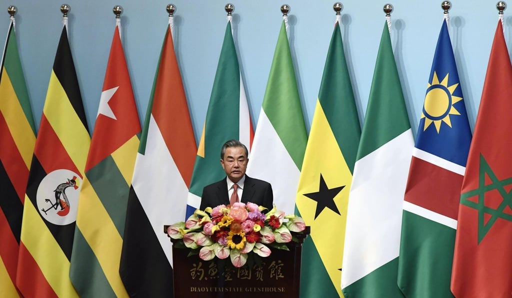 Chinese Foreign Minister Wang Yi speaks at the forum in Beijing. Photo: Kyodo