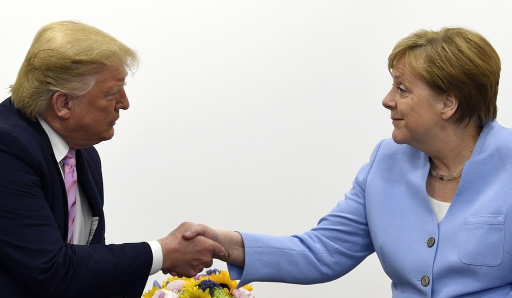 Trump and Merkel on Friday. Photo: AP