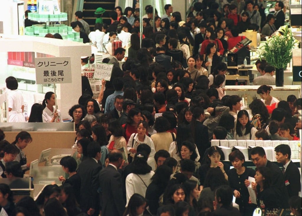 In October 1996 more than 10,000 people lined up for the then newly opened Takashimaya Times Square department store in Tokyo's Shinjuku district. Photo: AP