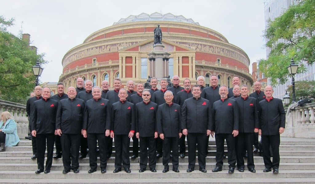 The Hong Kong Welsh Male Voice Choir in front of the Royal Albert Hall in London; their last visit to the UK was in 2016. The Hong Kong Welsh Male Voice Choir in front of the Royal Albert Hall in London; their last visit to the UK was in 2016.