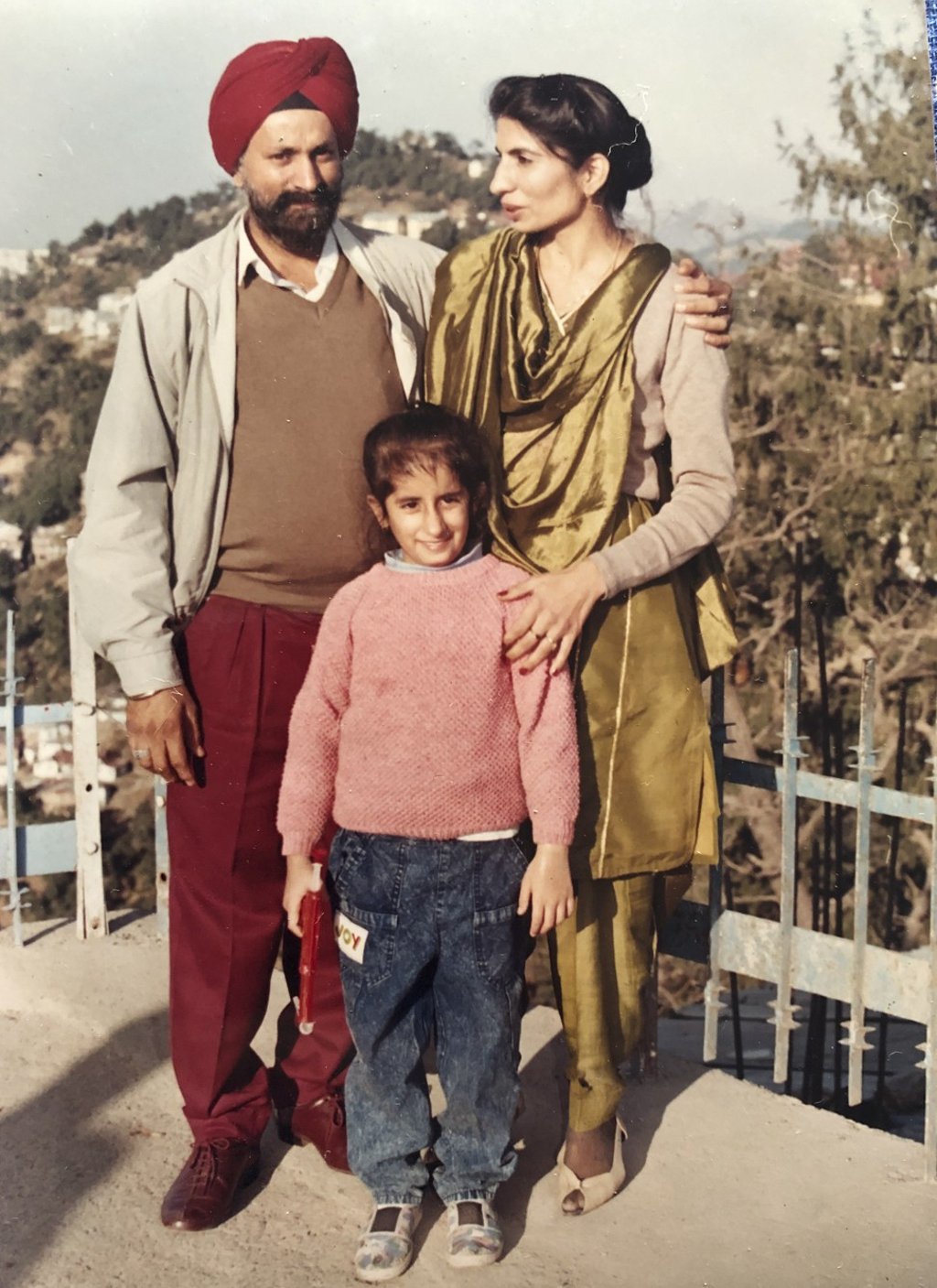 Guneet with her parents in a hill station in India. Photo: courtesy of Guneet Monga