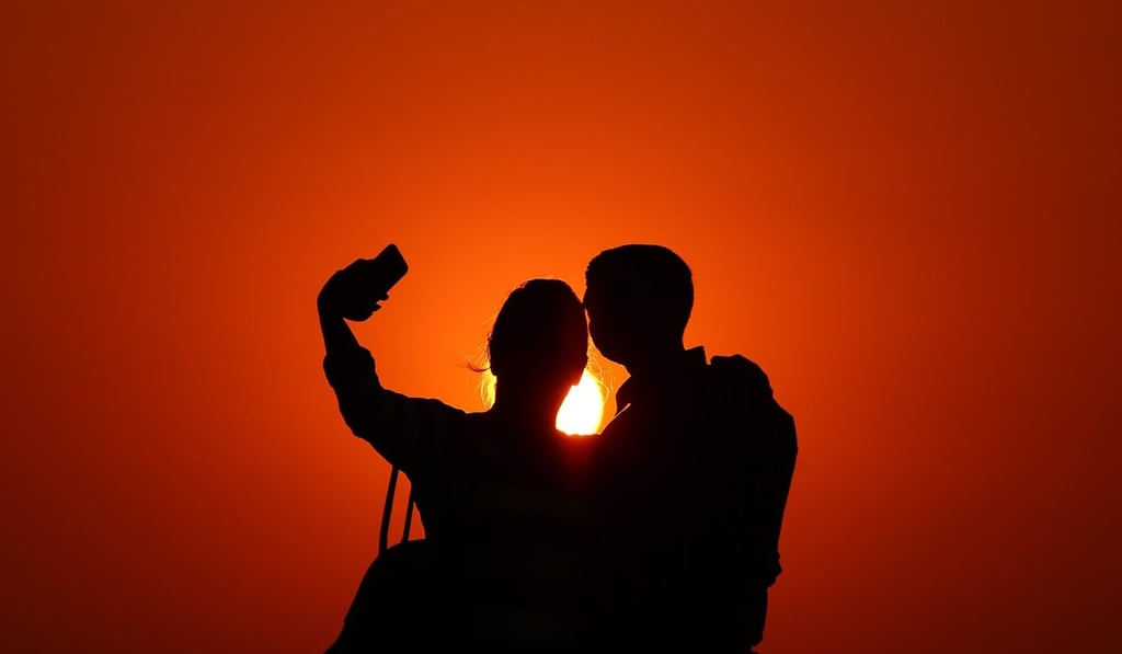 A couple taking a selfie in Mumbai, India, where selfie deaths eclipse numbers in other countries. Photo: EPA