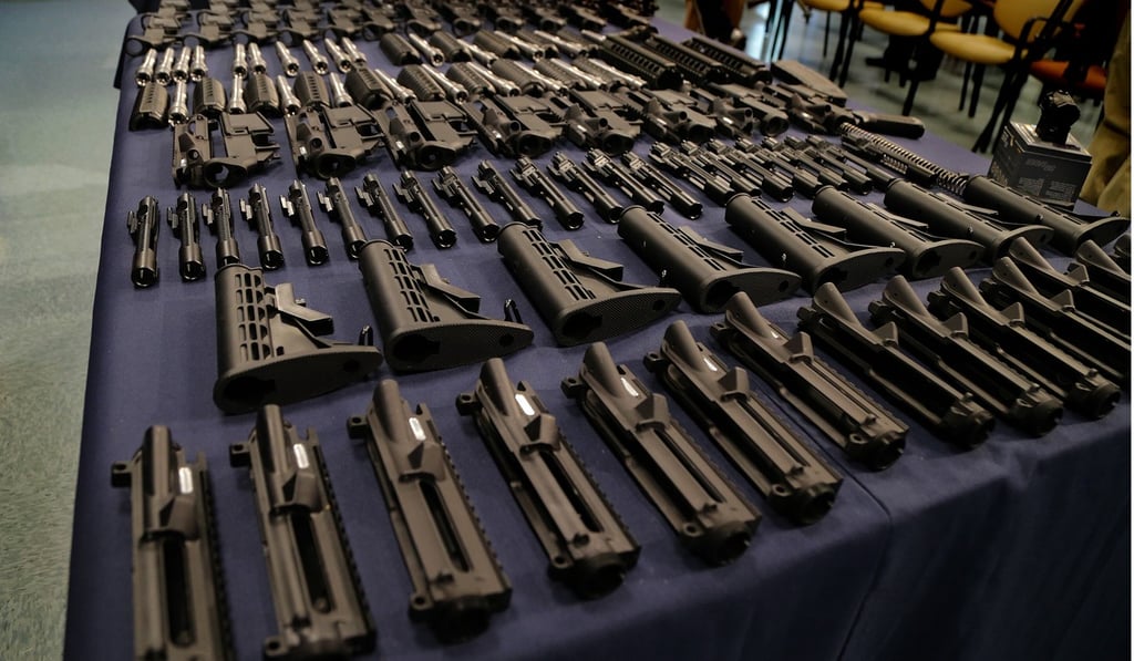 Weapons parts on display at Homeland Security Investigations headquarters in Miami on Friday. Photo: TNS