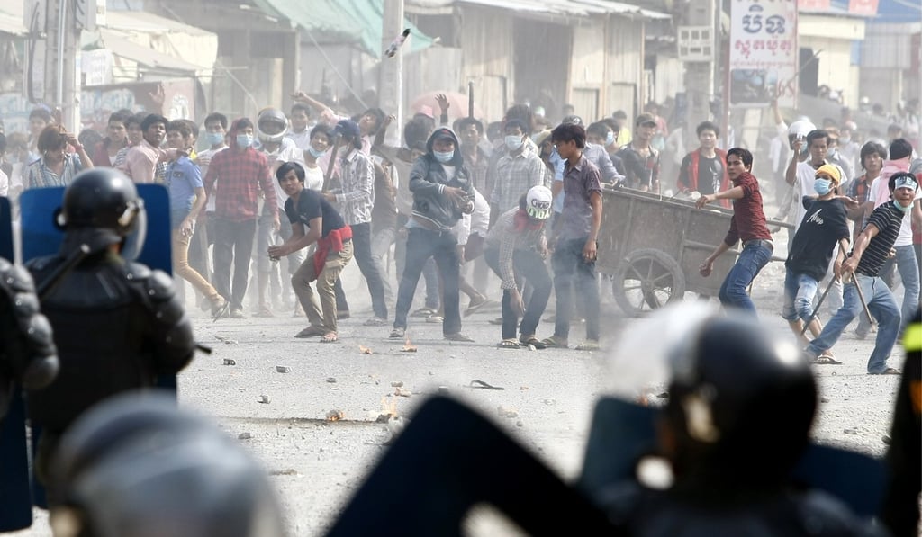 Cambodian garment factory workers on strike in 2014 to demand a better living wage. From police killings of protesters to mass faintings on the factory floor, Cambodia’s manufacturing sector, which makes apparel for major international brands, has come under increased scrutiny. Photo: AP