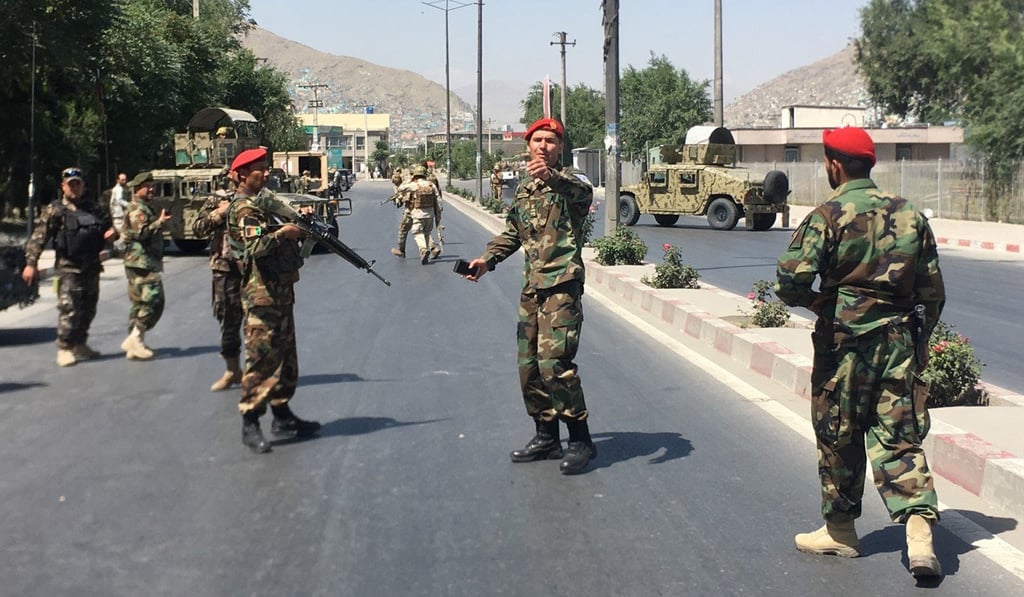 Afghan security forces at the scene of the explosion in Kabul. Photo: AP