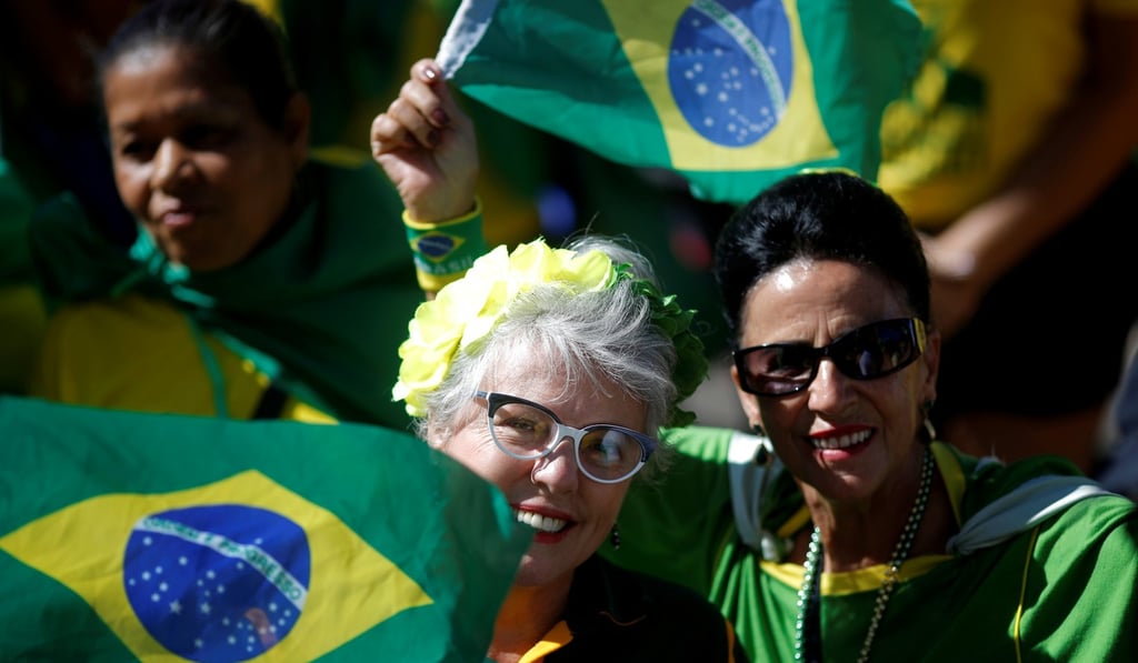 Demonstrators attend the protest against corruption. Photo: Reuters