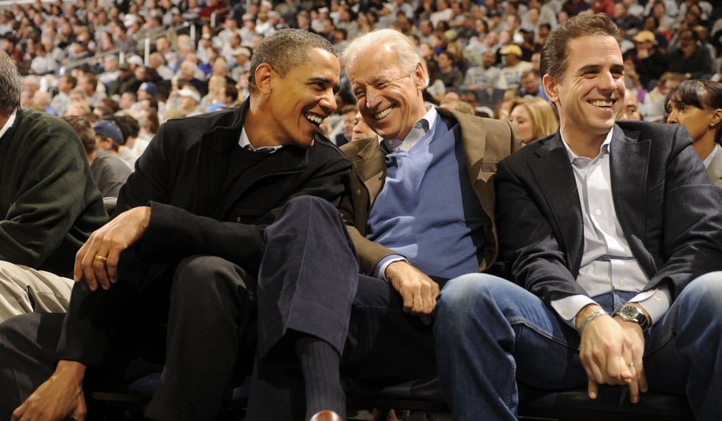 Barack Obama, Joe Biden and Hunter Biden at a college basketball game in Washington in 2010. Photo: AFP
