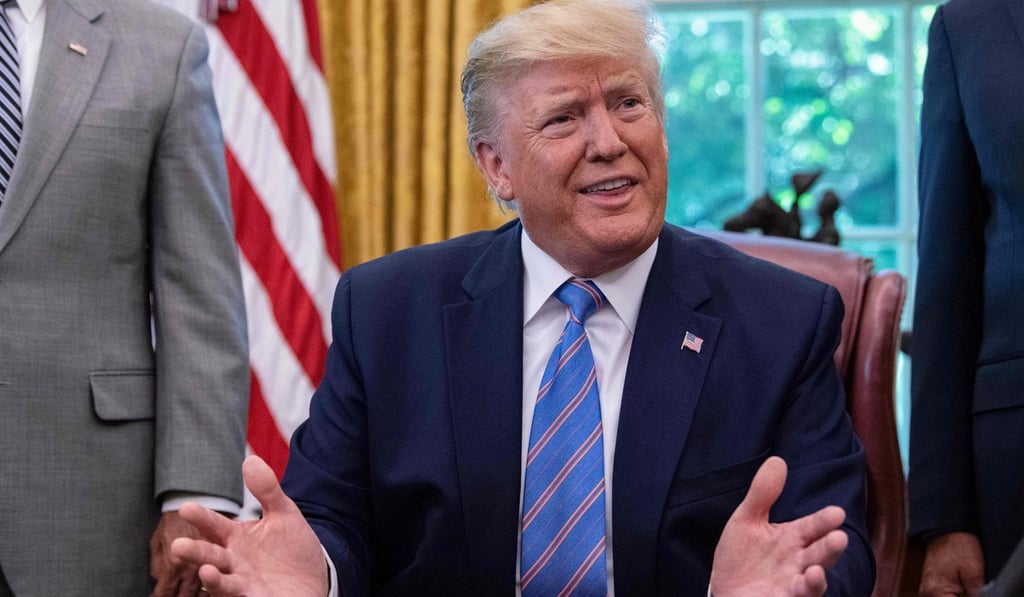 US President Donald Trump speaks to the press after signing a bill for border funding legislation in the Oval Office on Monday. Photo: AFP