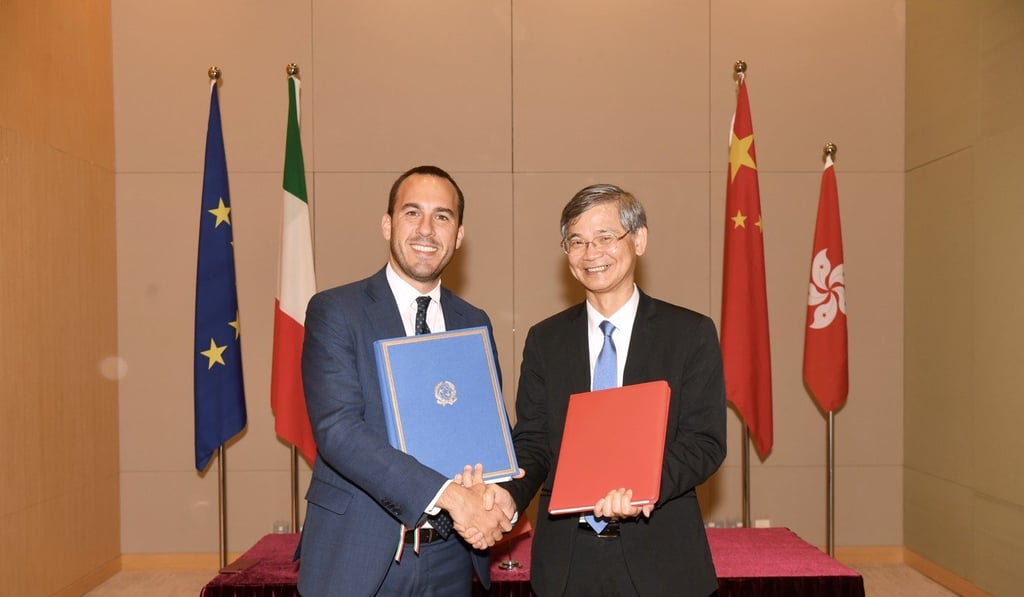 Secretary for Labour and Welfare Law Chi-kwong (right) and Italy’s Manlio Di Stefano announce the working holiday scheme in Hong Kong on Friday. Photo: Handout Secretary for Labour and Welfare Law Chi-kwong (right) and Italy’s Manlio Di Stefano announce the working holiday scheme in Hong Kong on Friday. Photo: Handout