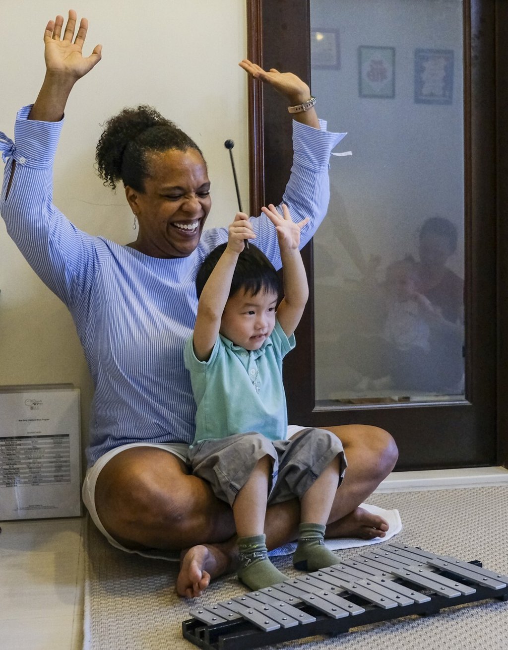 Best with Cameron playing a xylophone. Photo: Tory Ho