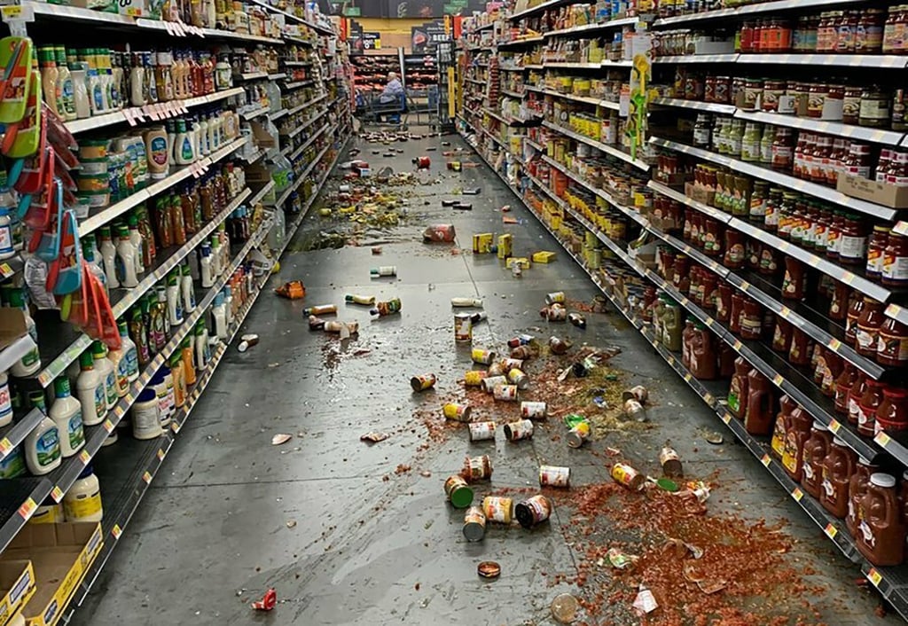Food items fall off the shelves at a Walmart store in Yucca Yalley, California. Photo: Chad Mayes via AP