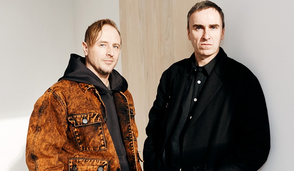 Sterling Ruby (left) – pictured with his frequent collaborator, Raf Simons, at Christian Dior and Calvin Klein – has launched his own brand, fashion brand, S.R. STUDIO LA. CA, in June.