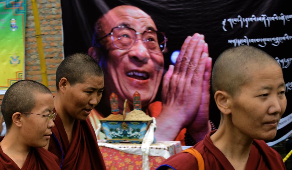 Tibetan nuns gather ahead of a procession to mark the 79th birthday of the Dalai Lama at Jawalakhel near Kathmandu in July 2014. Photo: AFP Tibetan nuns gather ahead of a procession to mark the 79th birthday of the Dalai Lama at Jawalakhel near Kathmandu in July 2014. Photo: AFP