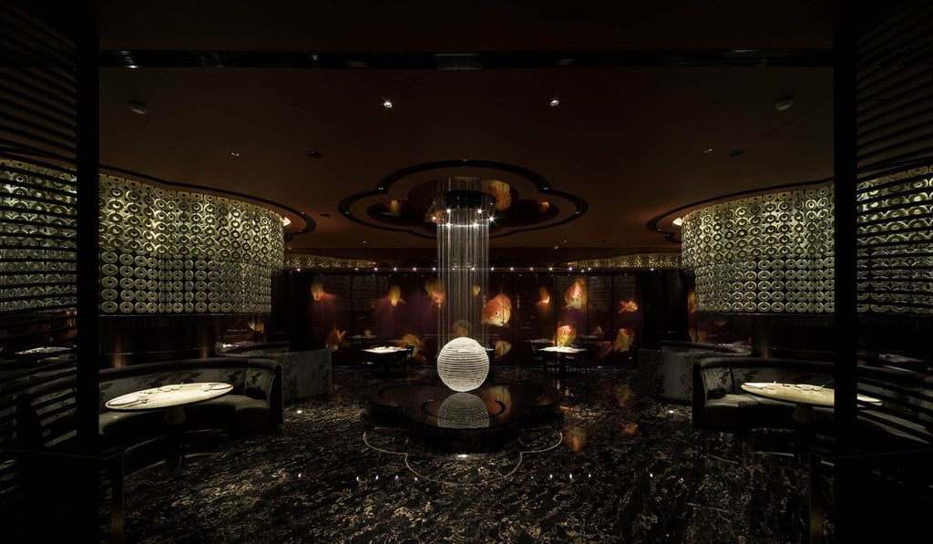 Interiors of The 8 – a three-Michelin-starred restaurant at Grand Lisboa in Macau – were designed by Steve Leung Designers. Interiors of The 8 – a three-Michelin-starred restaurant at Grand Lisboa in Macau – were designed by Steve Leung Designers.