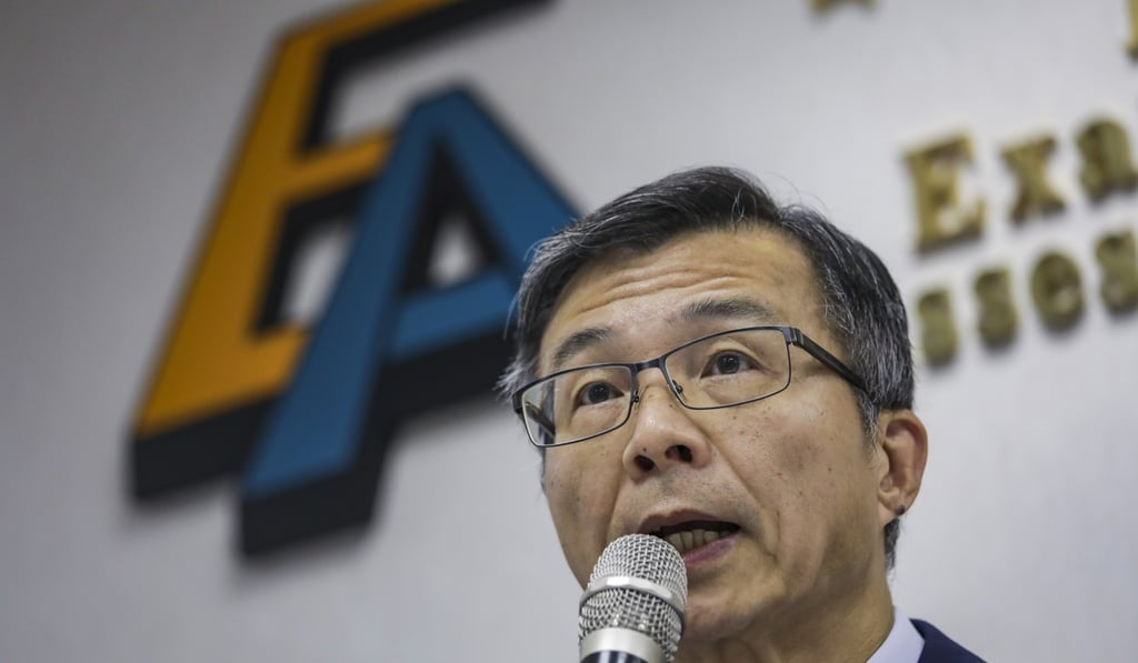 So Kwok-sang, from the Examinations and Assessment Authority, hails the best results for elite students since the introduction of the Diploma of Secondary Education. Photo: Tory Ho