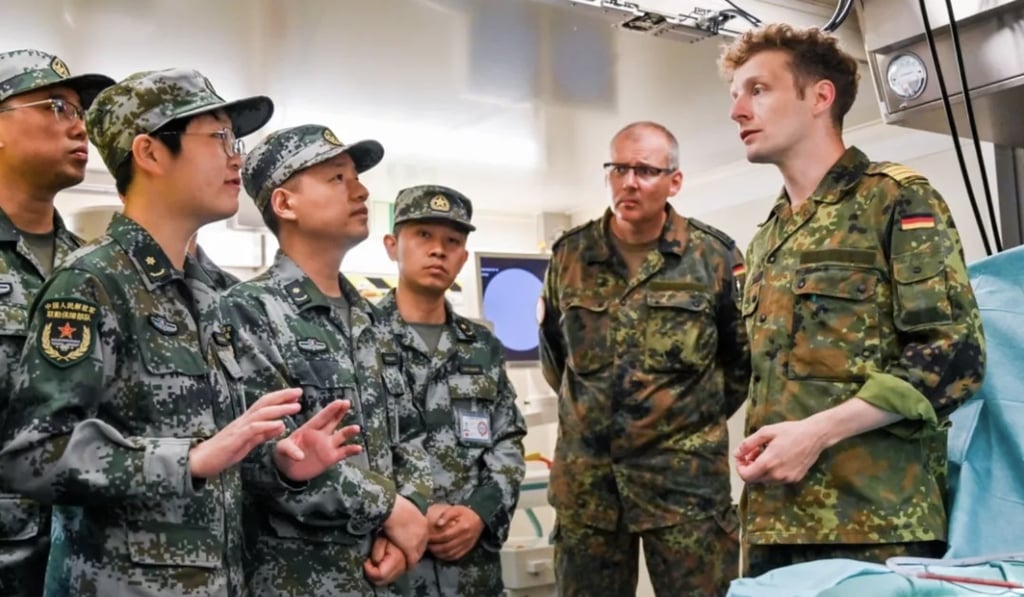 Chinese and German soldiers are tackling scenarios including an outbreak of cholera in a refugee camp and a bomb strike on a UN vehicle. Photo: Xinhua Chinese and German soldiers are tackling scenarios including an outbreak of cholera in a refugee camp and a bomb strike on a UN vehicle. Photo: Xinhua