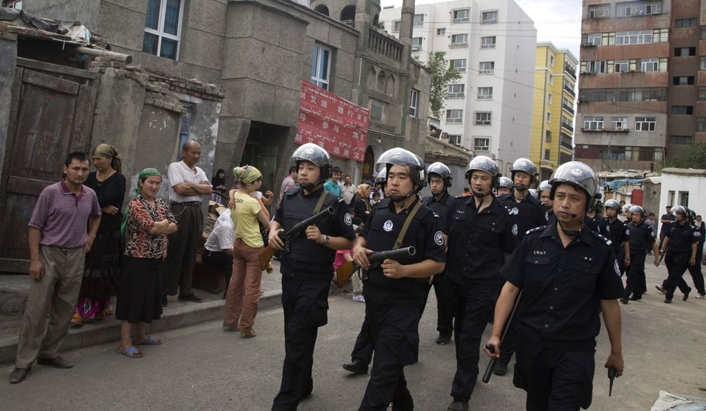 China describes the camps as training centres that are used to help stamp out extremism and give people new skills. Photo: AP China describes the camps as training centres that are used to help stamp out extremism and give people new skills. Photo: AP