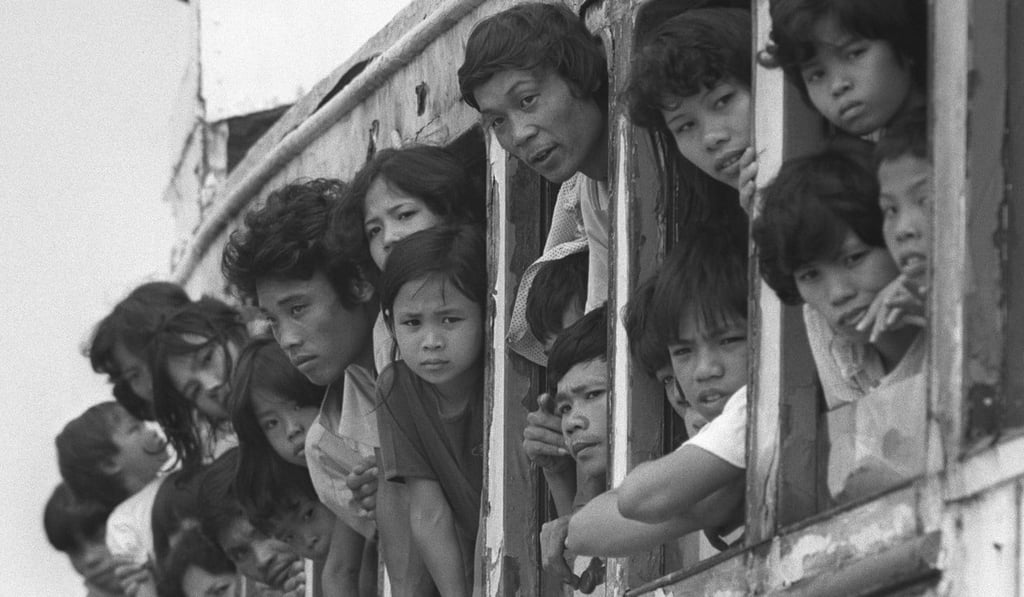 Vietnamese boatpeople crammed on a ferry off Stonecutters Island. Photo: Oliver Tsang
