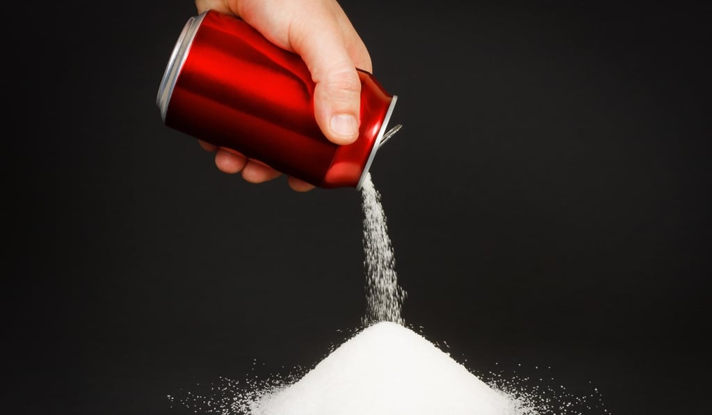 An increase of 100ml – a third of a can of Coke – of sugary drinks per day was associated with an 18 per cent increased risk of cancer. Photo: Alamy