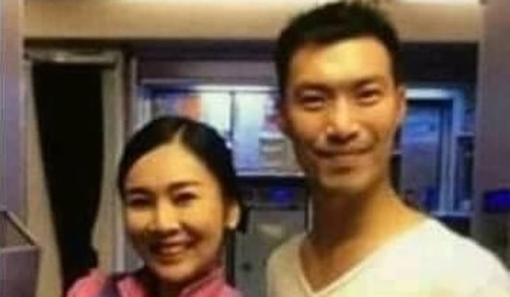 A Thai Airways flight attendant poses for a photo with Thanathorn Juangroongruangkit. Photo: Facebook / Sasaki Anchalee A Thai Airways flight attendant poses for a photo with Thanathorn Juangroongruangkit. Photo: Facebook / Sasaki Anchalee