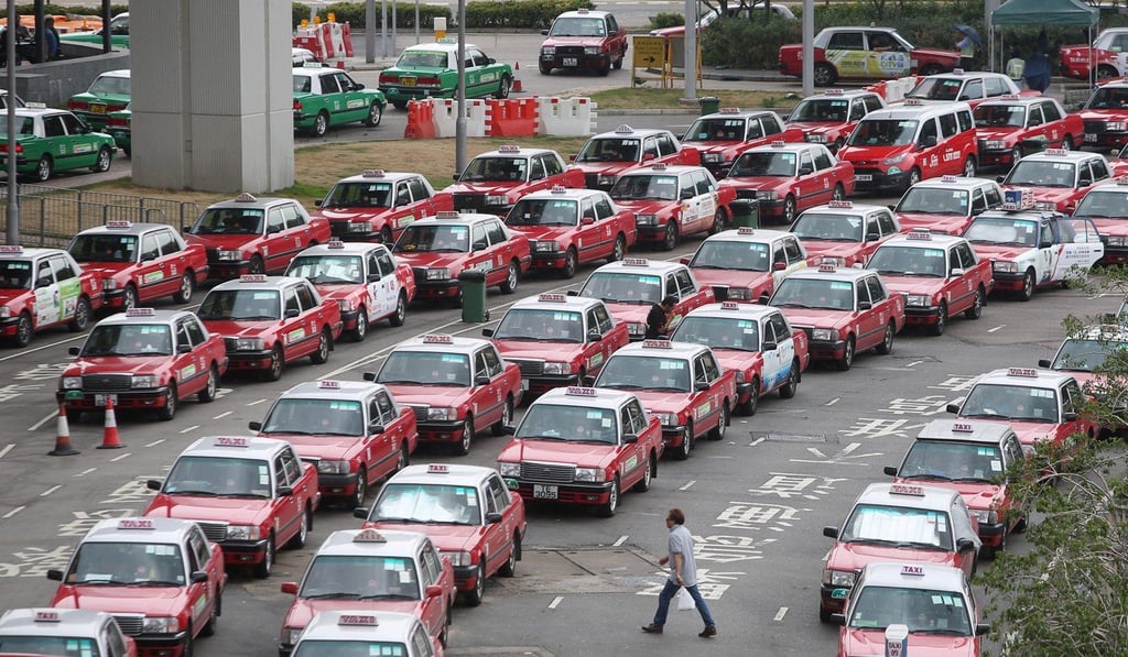 The premium taxis will have enhanced services such as Wi-fi, phone-charging stations and 24-hour customer service. At least half of the taxis will also offer services for wheelchair users. Photo: Sam Tsang
