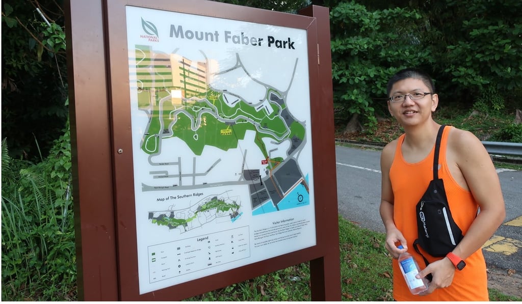 Running tour guide Caleb Tey at the start of the Marang Hill Trail in Mount Faber Park, Singapore. Photo: Amy Fallon