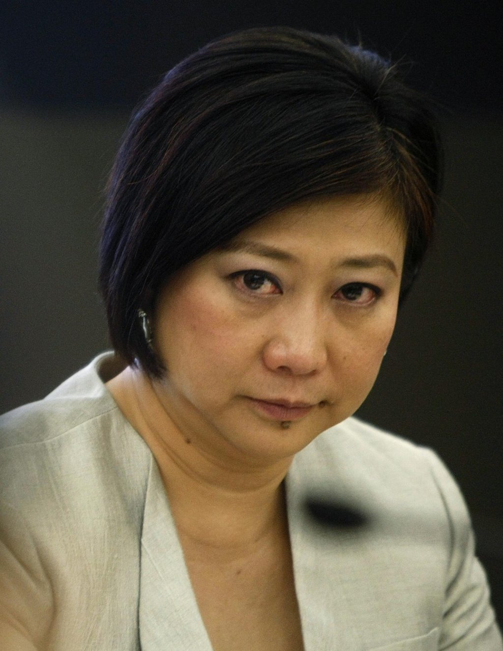 Singtel’s Chief Executive Chua Sock Koong has taken a pay cut. Photo: Reuters