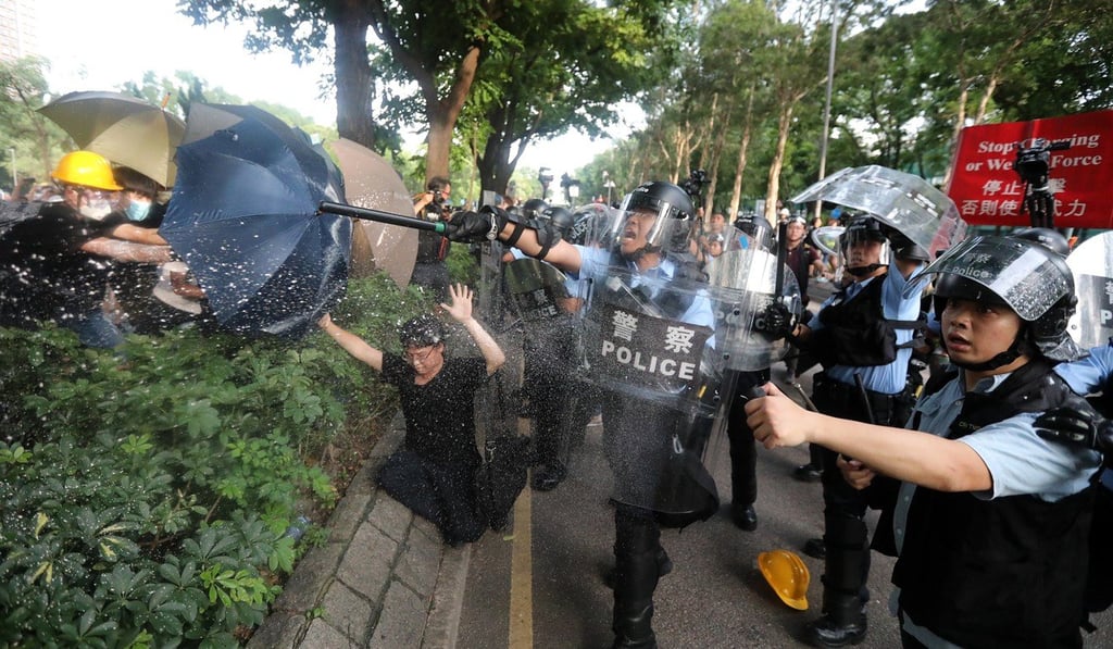 Protesters clash with police after the march in Sheung Shui ends. Photo: Felix Wong