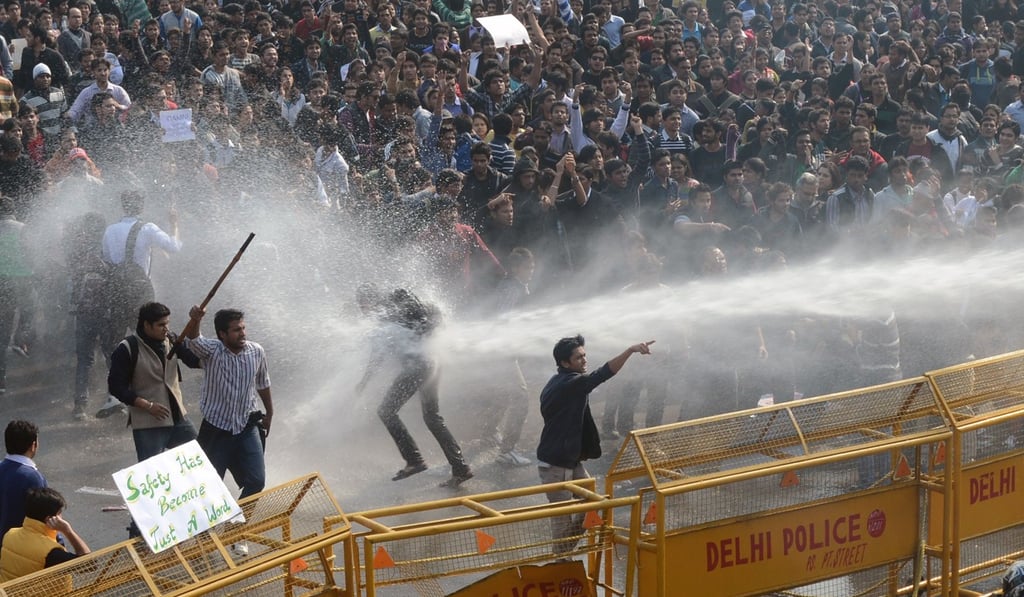 The police use a water cannon to disperse protesters calling for better safety for women following the gang-rape of a woman in New Delhi, on December 22, 2012. Photo: AFP