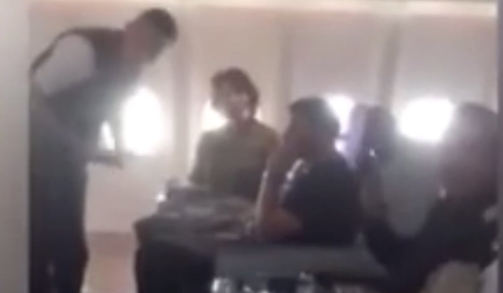 A screenshot of the video filmed during the Air China flight, and later posted to Weibo, of the incident in business class. Photo: Weibo