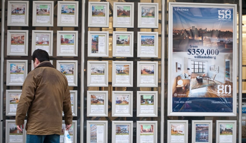 A prospective buyer browses property listings in New York. Photo: Alamy A prospective buyer browses property listings in New York. Photo: Alamy