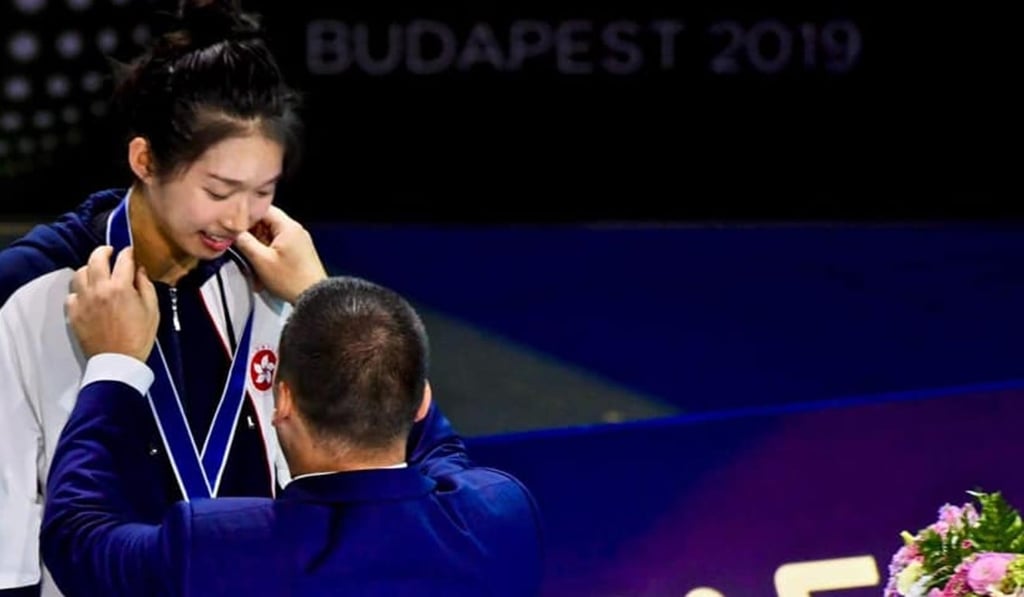 Vivian Kong receives her bronze medal at the world championships. Photo: Hong Kong Fencing Association