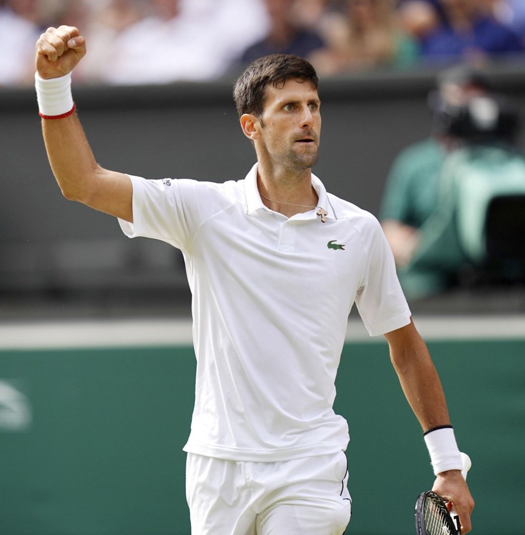 Djokovic celebrates success at Wimbledon. Photo: Kyodo Djokovic celebrates success at Wimbledon. Photo: Kyodo