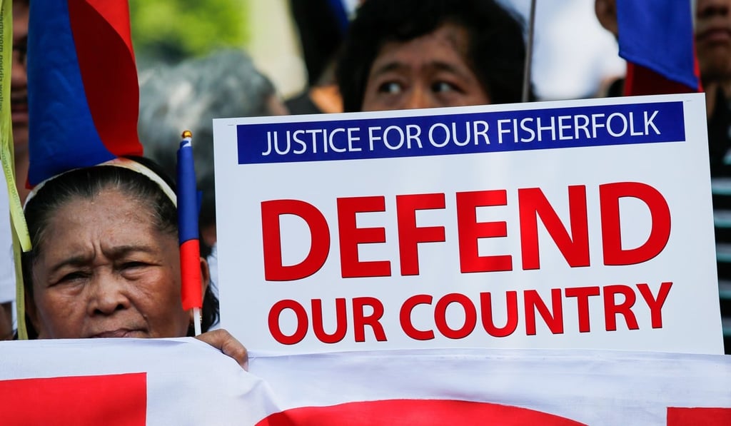 People in the Philippines protest against the alleged sinking of a fishing boat by a Chinese vessel. Photo: EPA-EFE