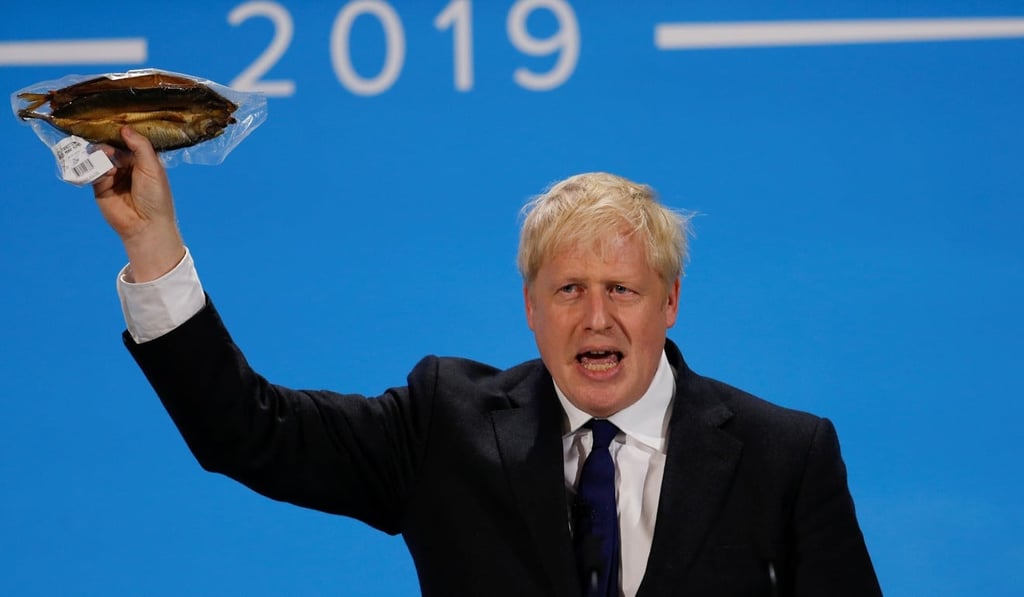Boris Johnson holding a kipper at a Conservative Party leadership campaign rally in London on Wednesday. Photo: Reuters Boris Johnson holding a kipper at a Conservative Party leadership campaign rally in London on Wednesday. Photo: Reuters